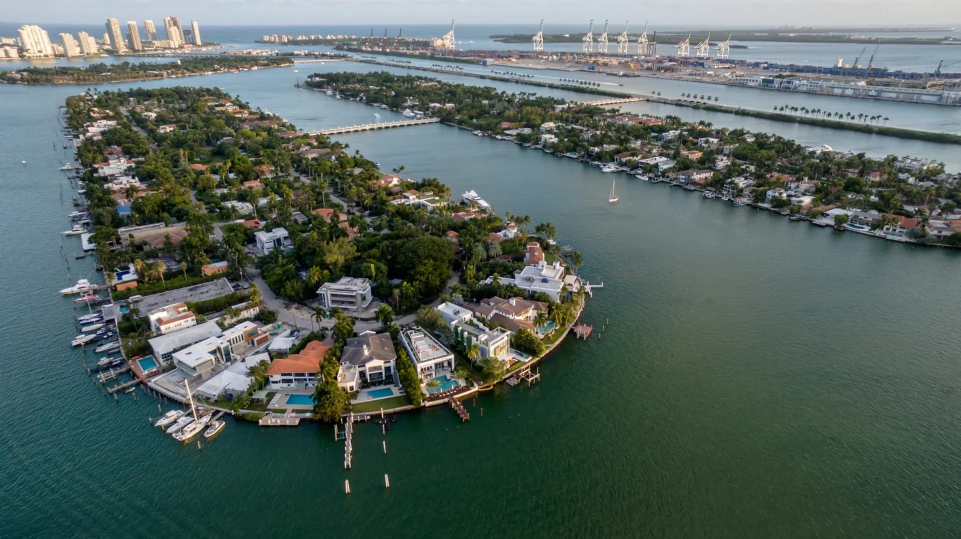 Aerial view of Palm and Hibiscus Islands, their connecting bridge and MacArthur Causeway