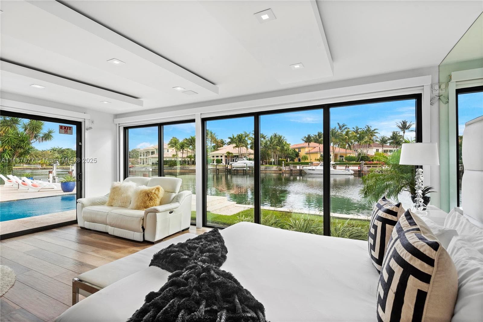 Sunlit suite with pool outlook