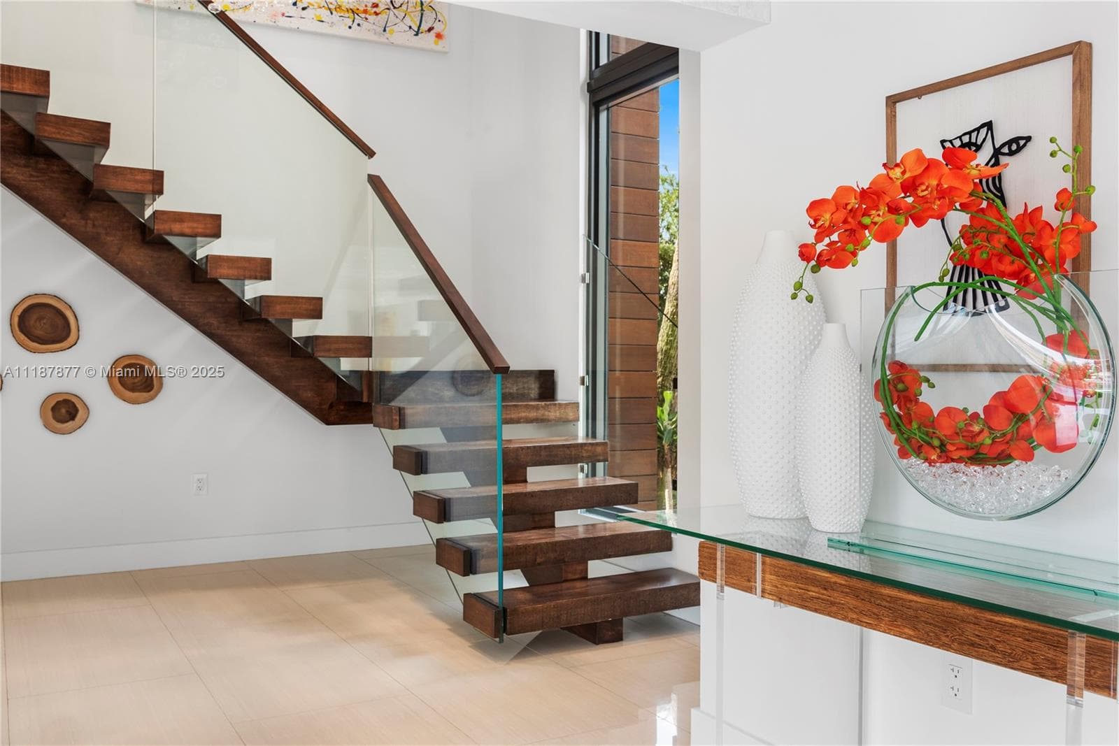 Wood and glass stairs with flower pop