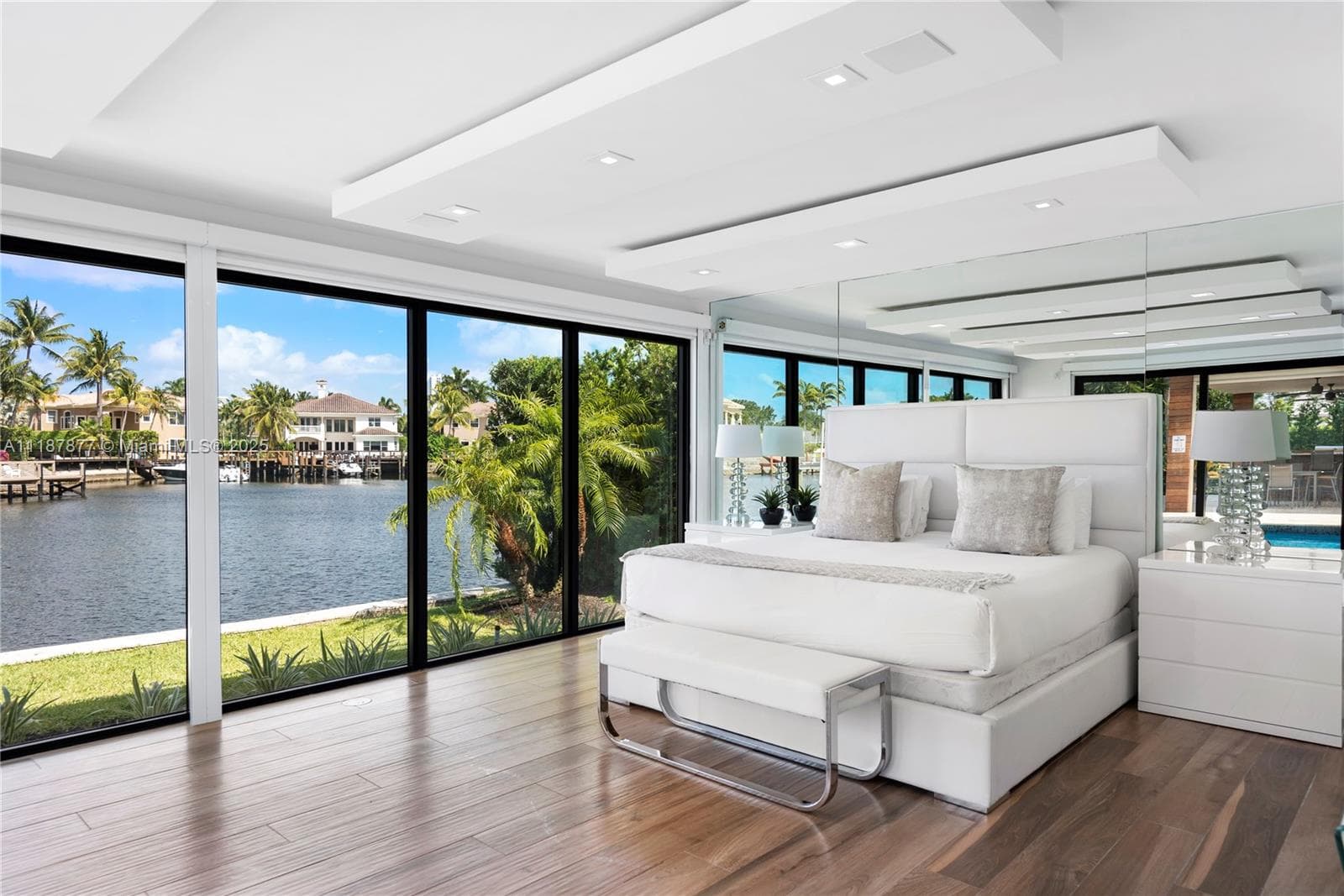 Water view suite with wall to wall glass
