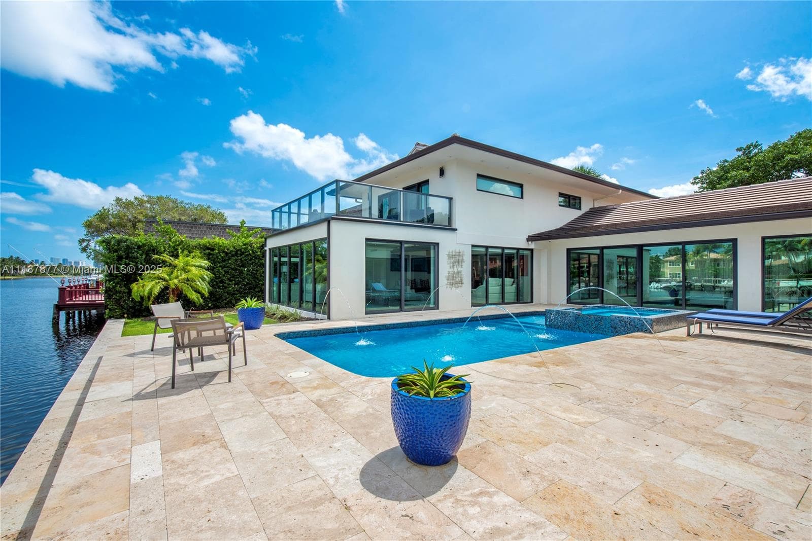 Back of structure with sparkling pool