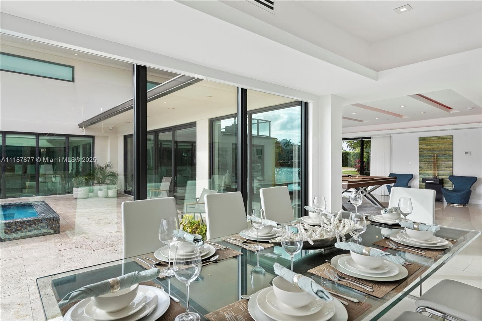 Patio dining tucked beside the water