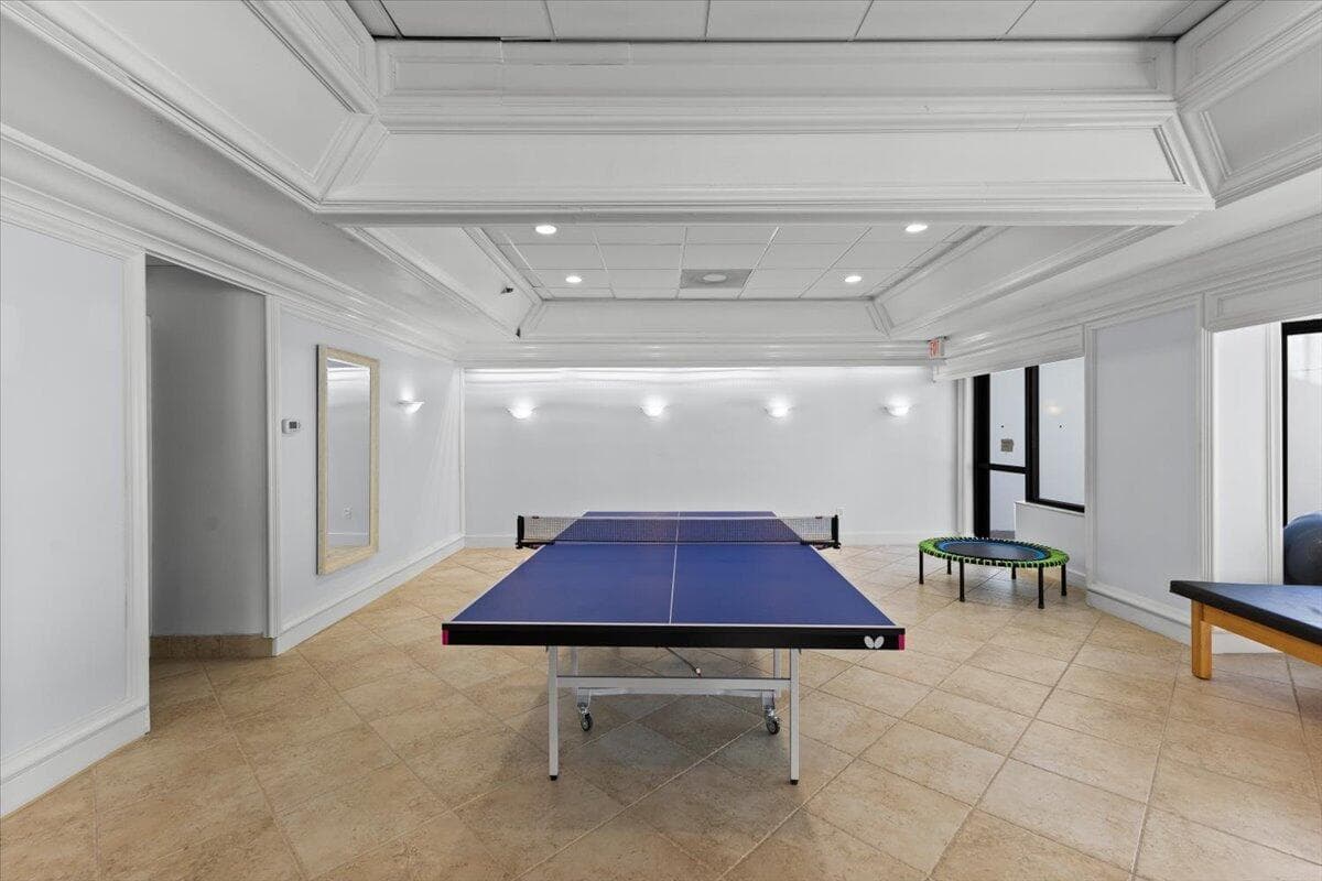 Game room with ping pong table