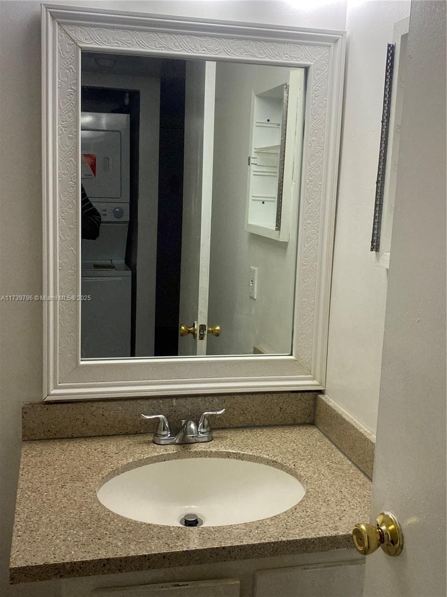 front bathroom with combination tub/shower