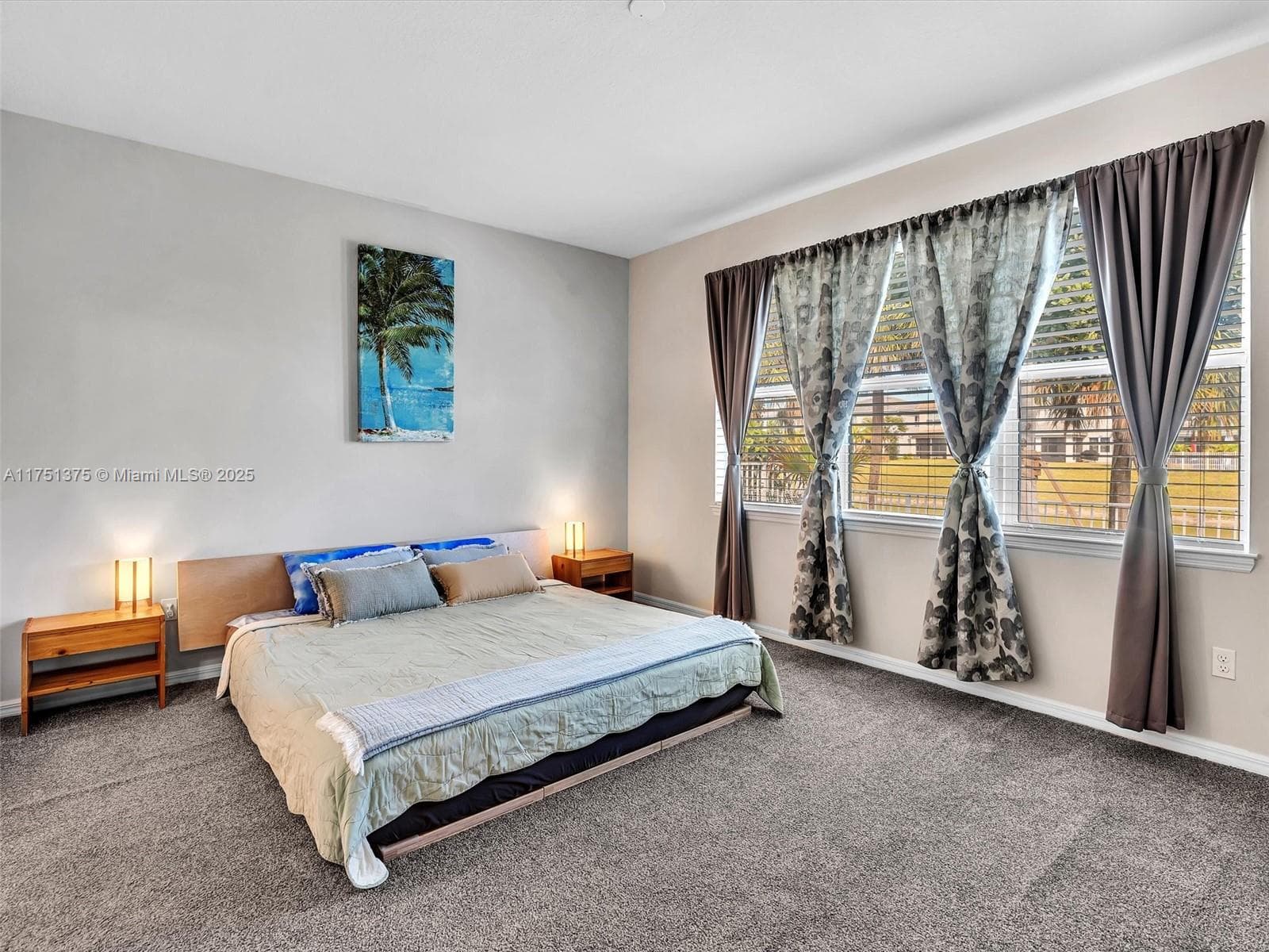 Primary bedroom is large and overlooks the lake