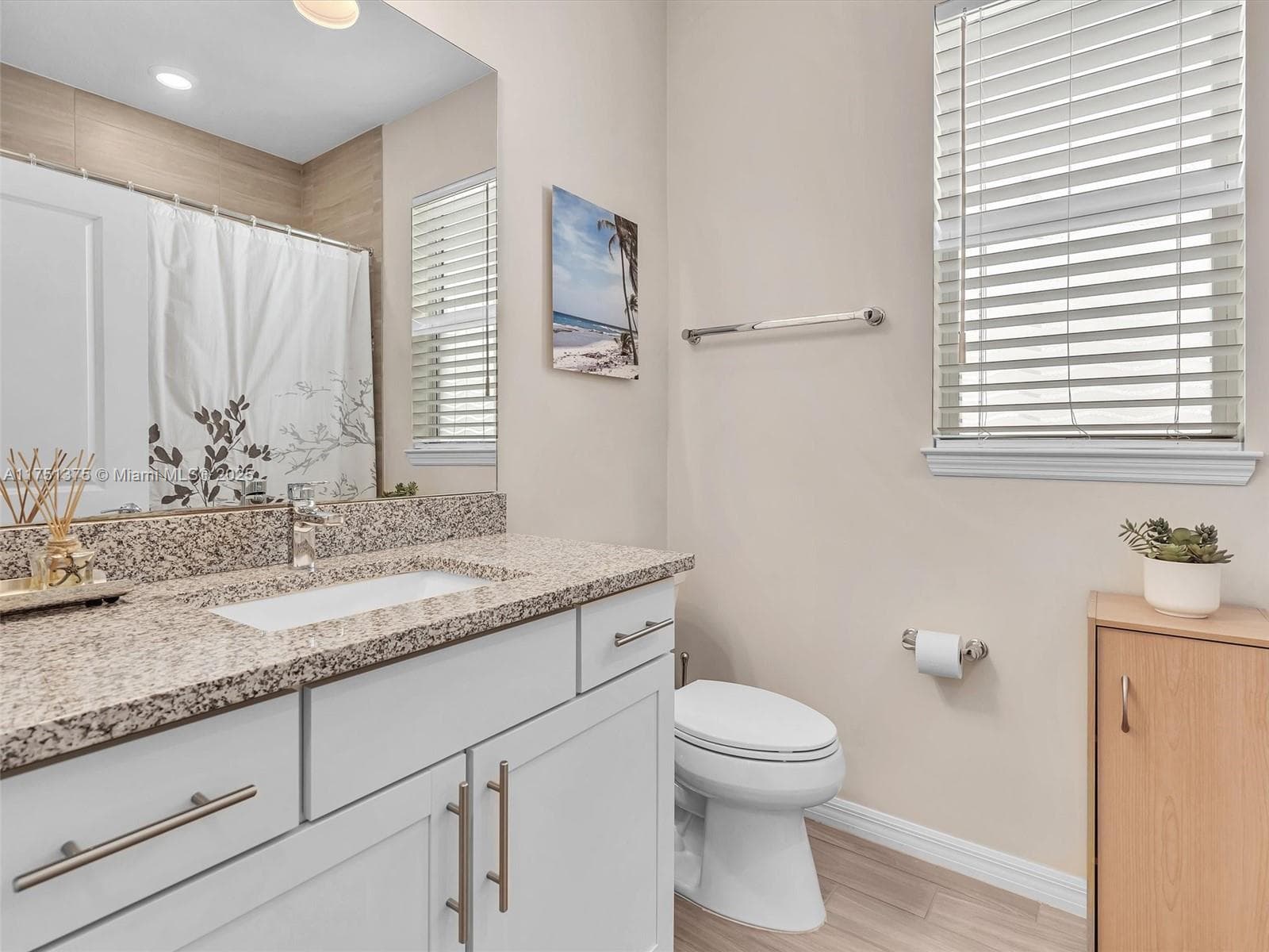 Guest bathroom with upgraded vanities and fixtures