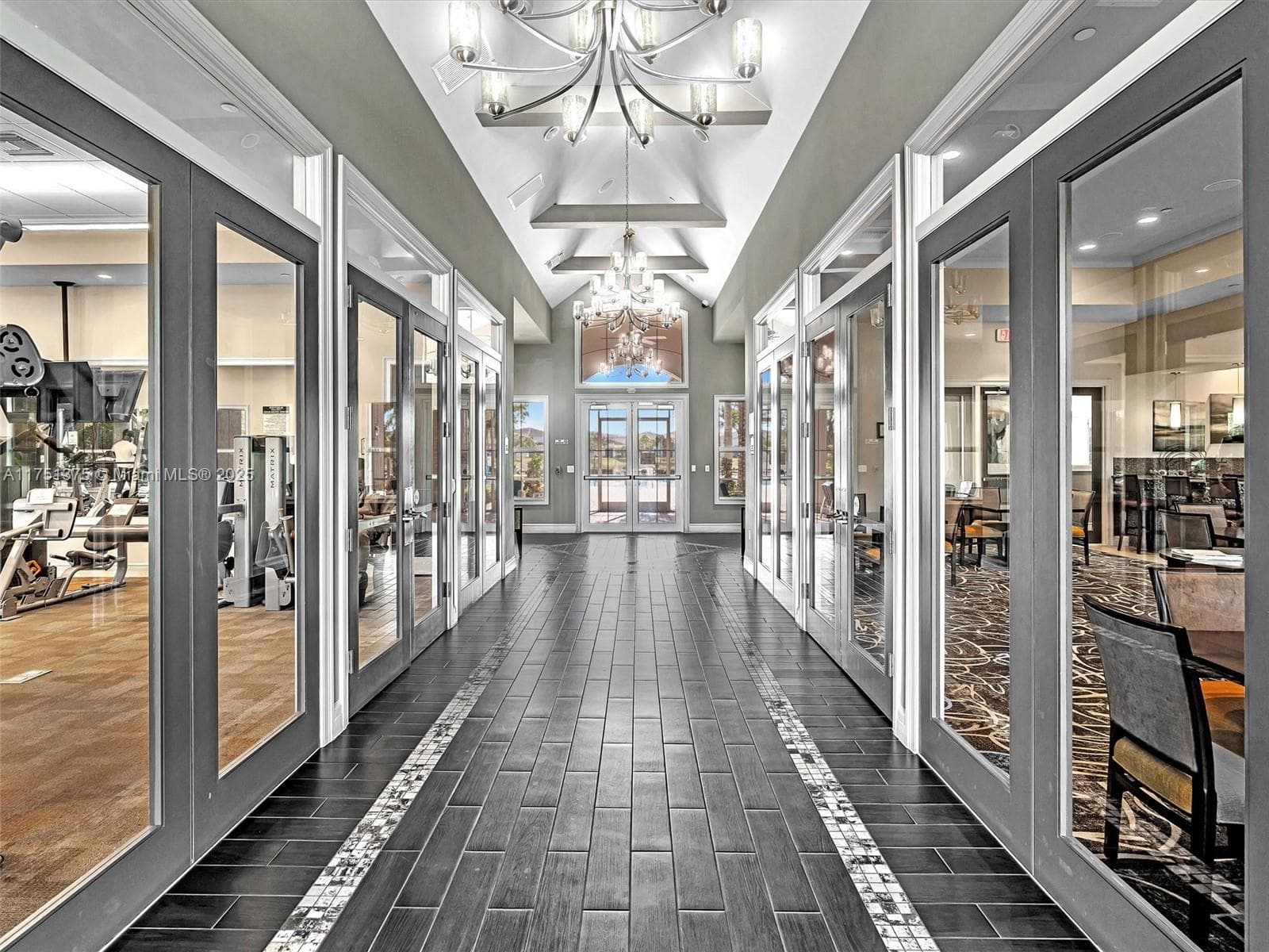 Entry into the clubhouse featuring full gym, pool, and multiple community rooms for resident use only.