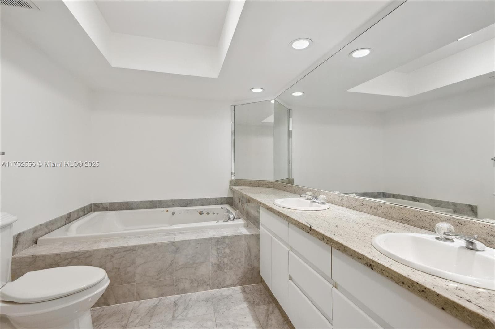 Spacious Primary Bathroom w/ Dual Sinks, Standup Shower and Separate Tub.