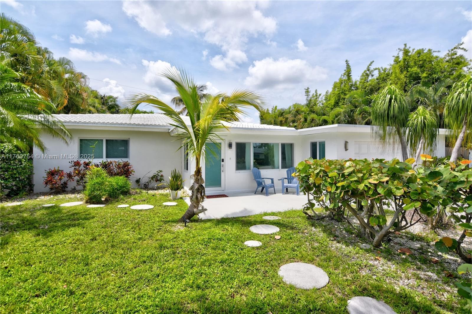 One story tastefully remodeled Mid Century home with large pool.