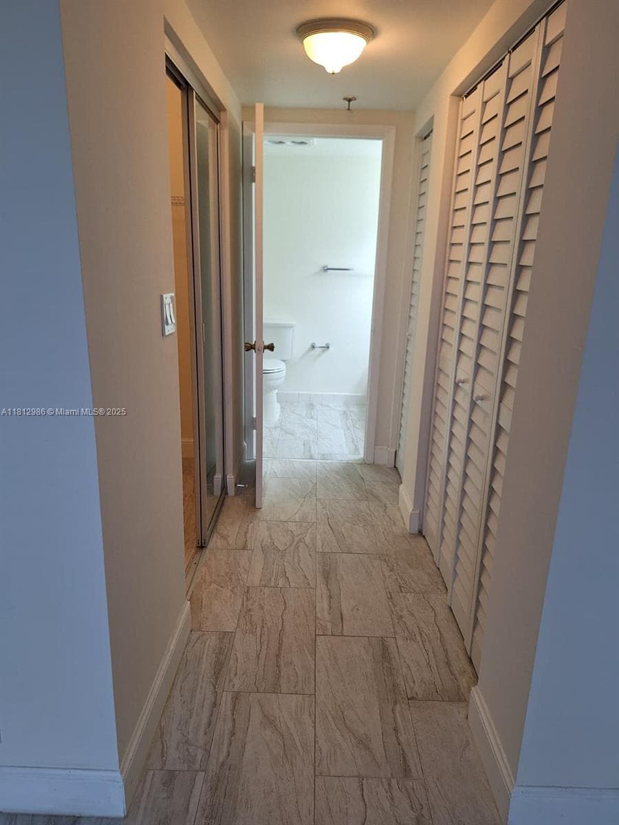 Hallway to master bathroom