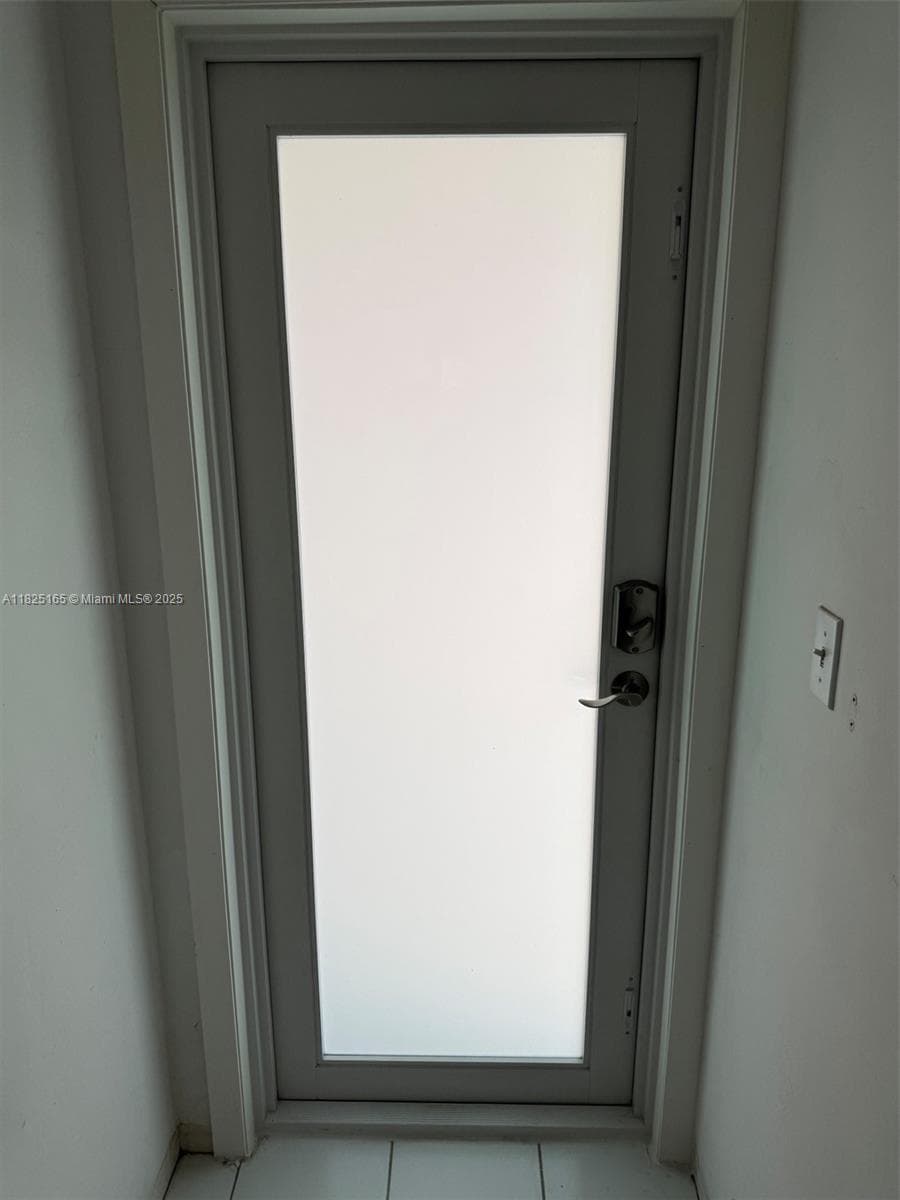 Impact door in bedroom leading to back stairs