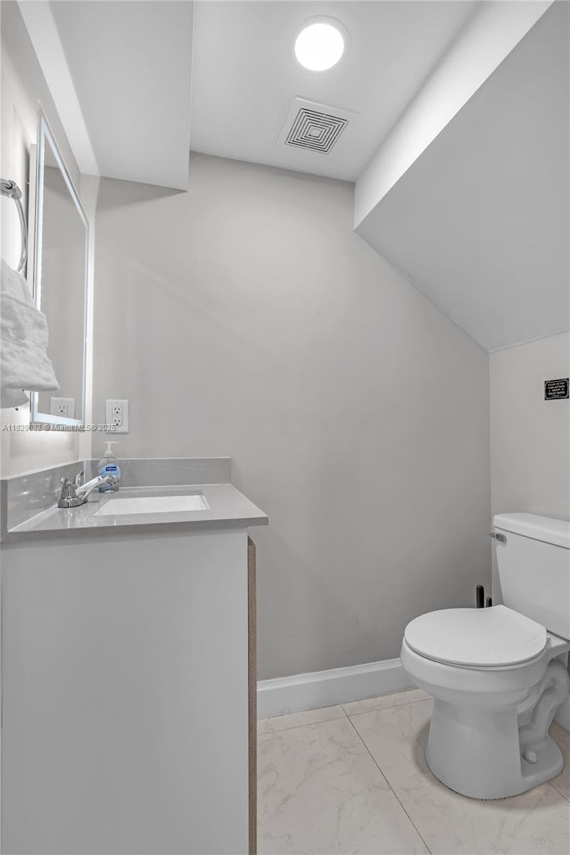1/2 BATH DOWNSTAIRS