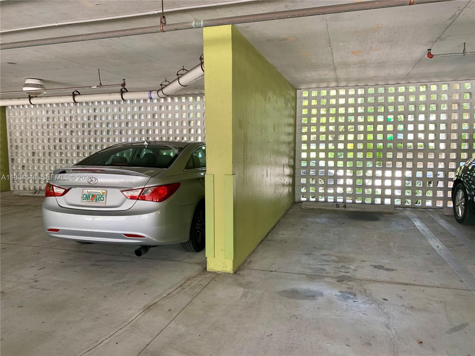 2 parking spaces assigned 53 and 54.
