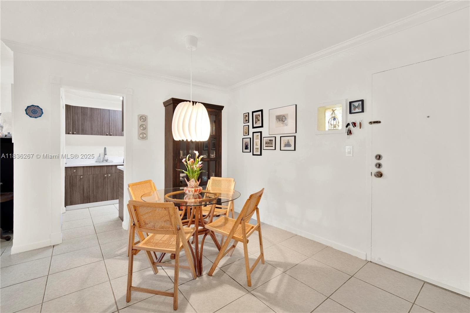 Dining room with the kitchen in the background