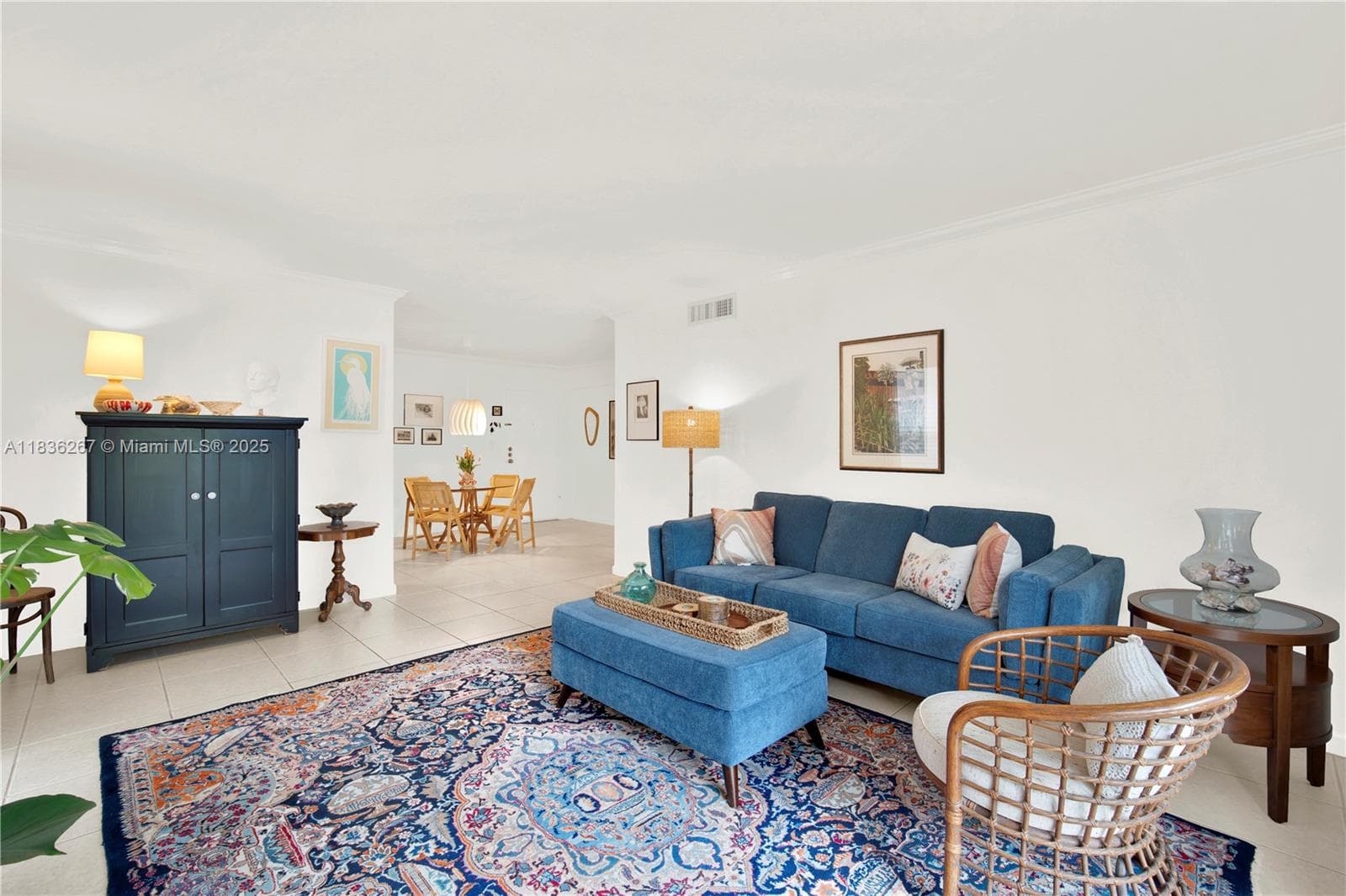 Living room with the view of the dining room in the back