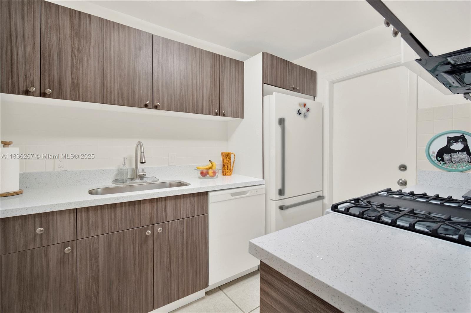 Kitchen with newer cabinets and appliances.