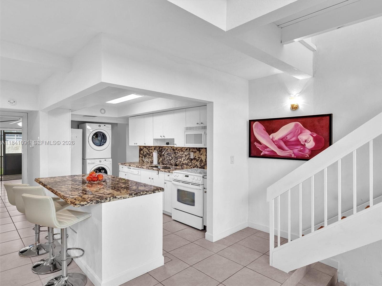 Wood cabinets and granite counters.