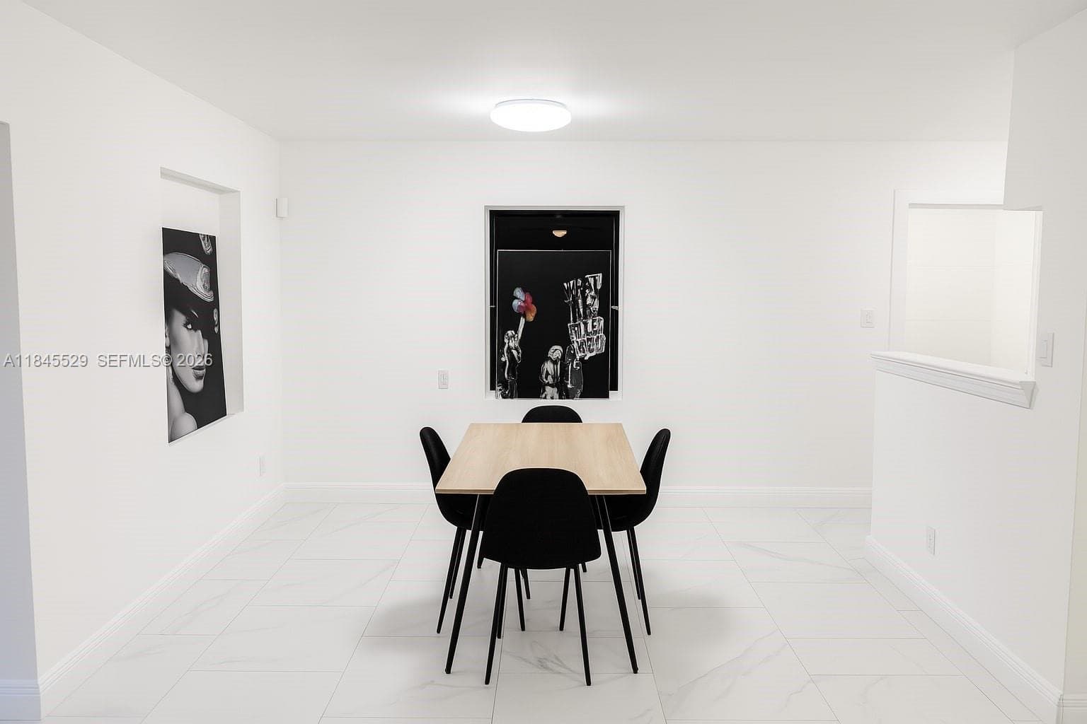 Dining area, smooth wall finishes & open concept connects dining area to kitchen