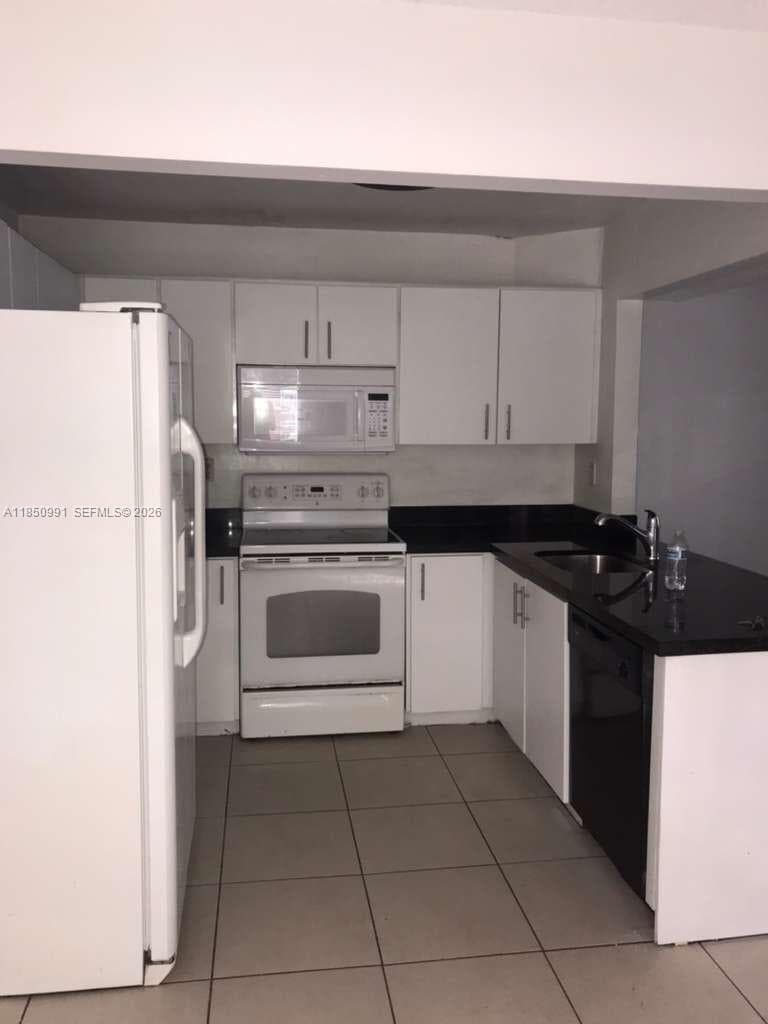 MONTEREY VILLAGE-TWO COND · #103-12 in Miami - Photo 4