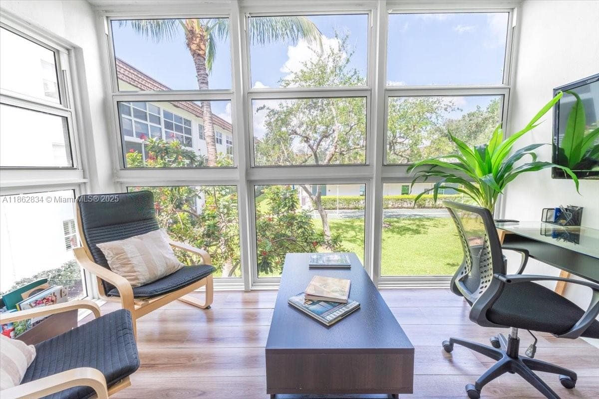 Florida Room overlooking relaxing courtyard