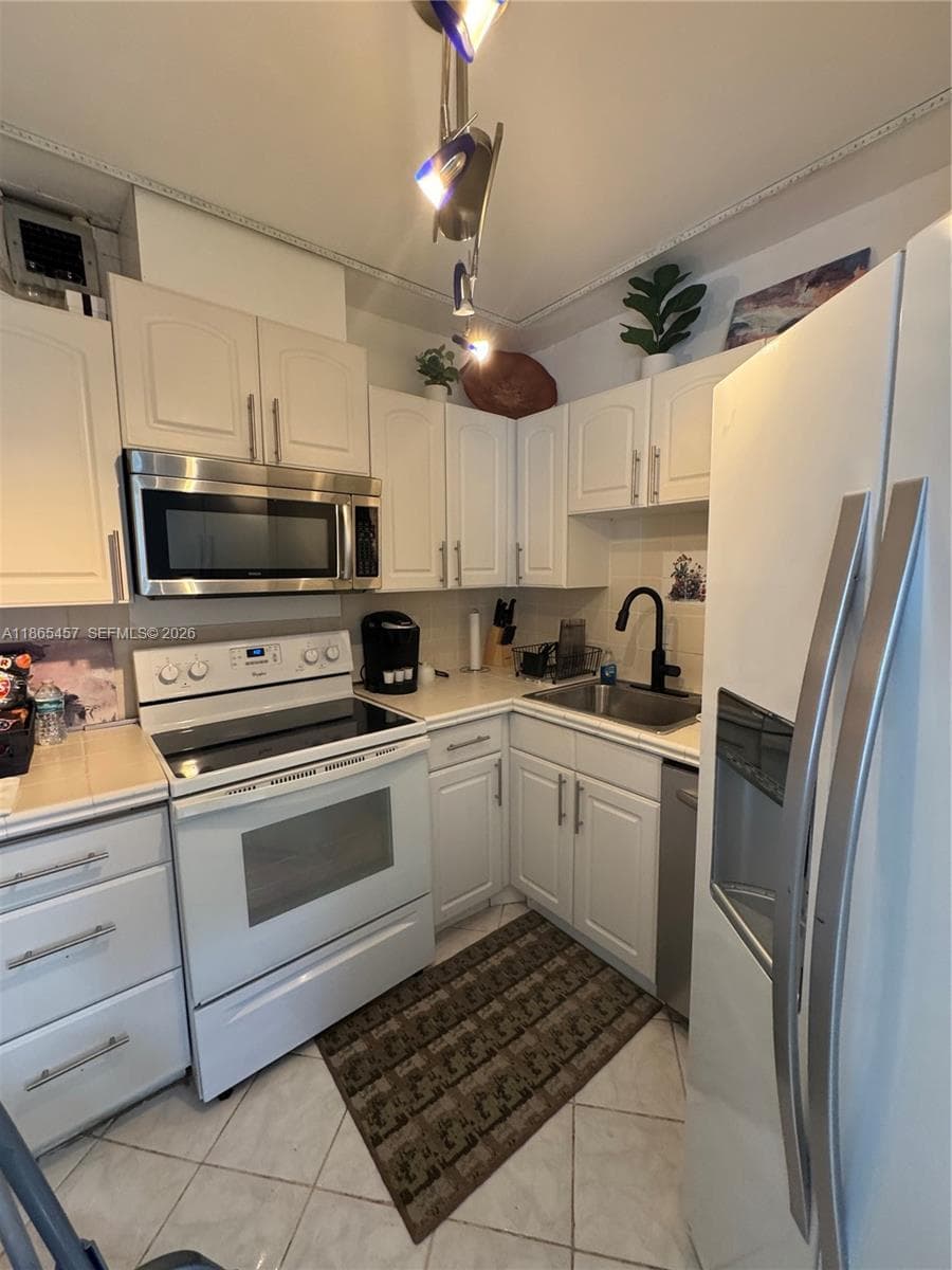 VILLAGE BY THE SEA CONDO · #315-C in Lauderdale By The Sea - Photo 6