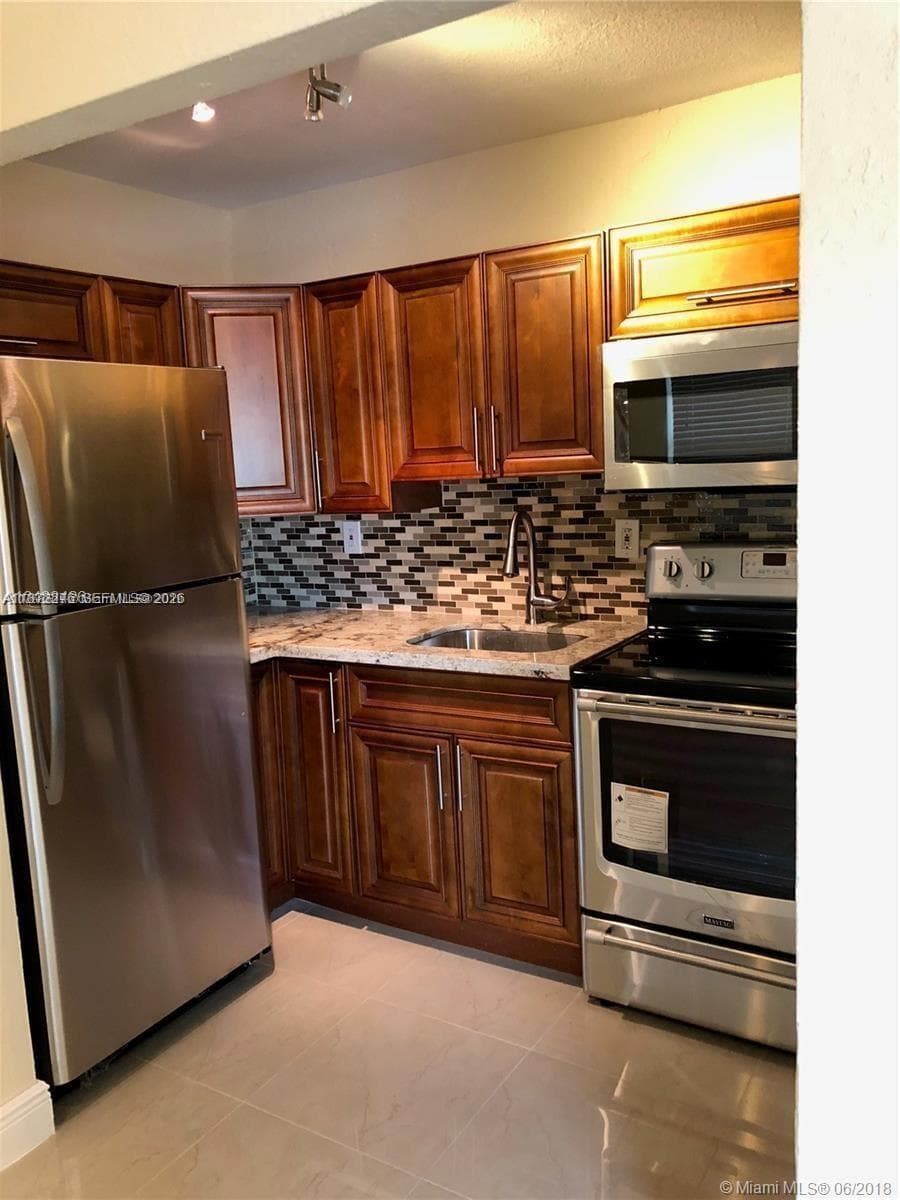 PALMS AT DANIA BEACH COND · #207 in Dania Beach - Photo 1