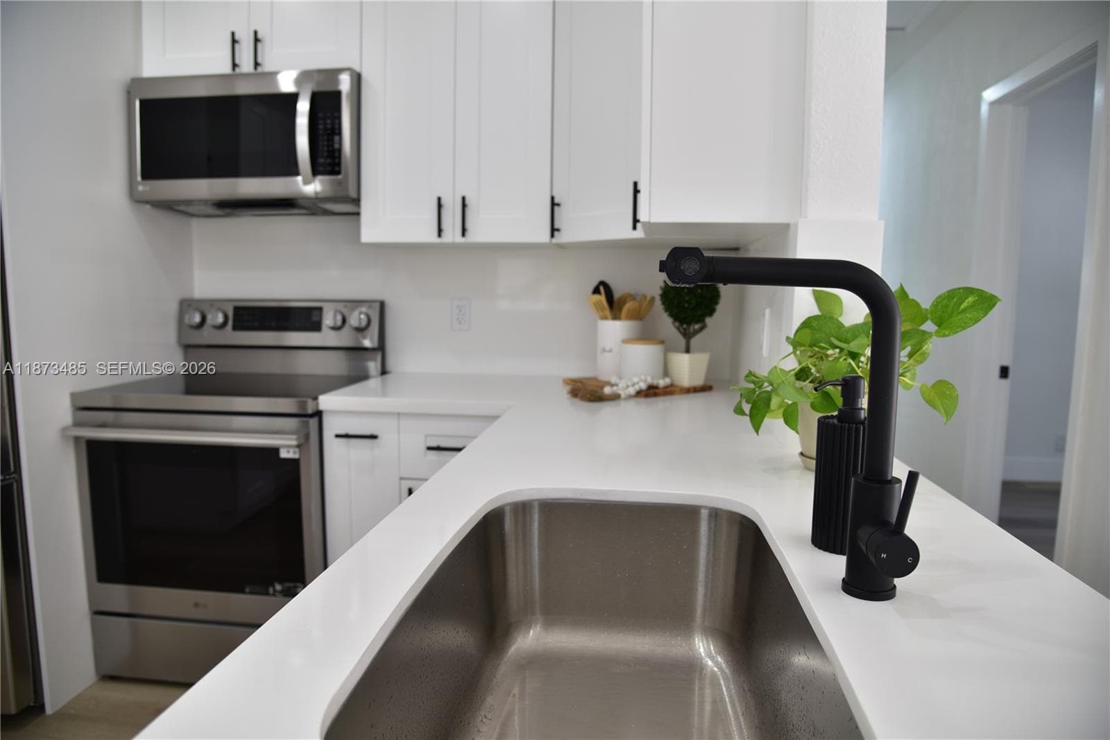 Updated bathroom with a stylish shower combo, contemporary vanity, and modern finishes.