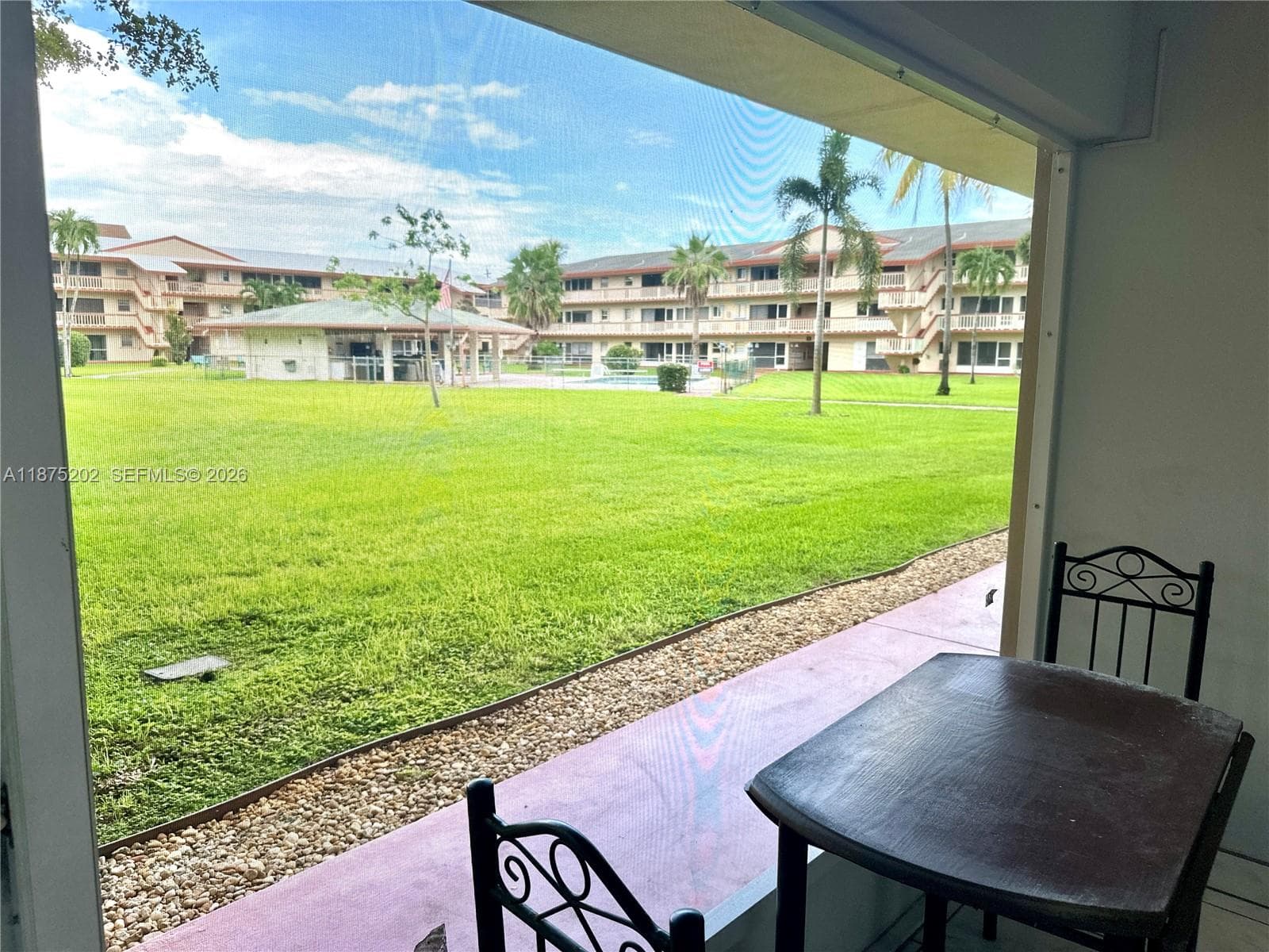 Enclosed patio at the entrance of the unit