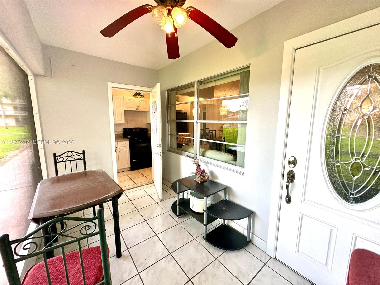 Enclosed patio at the entrance of the unit