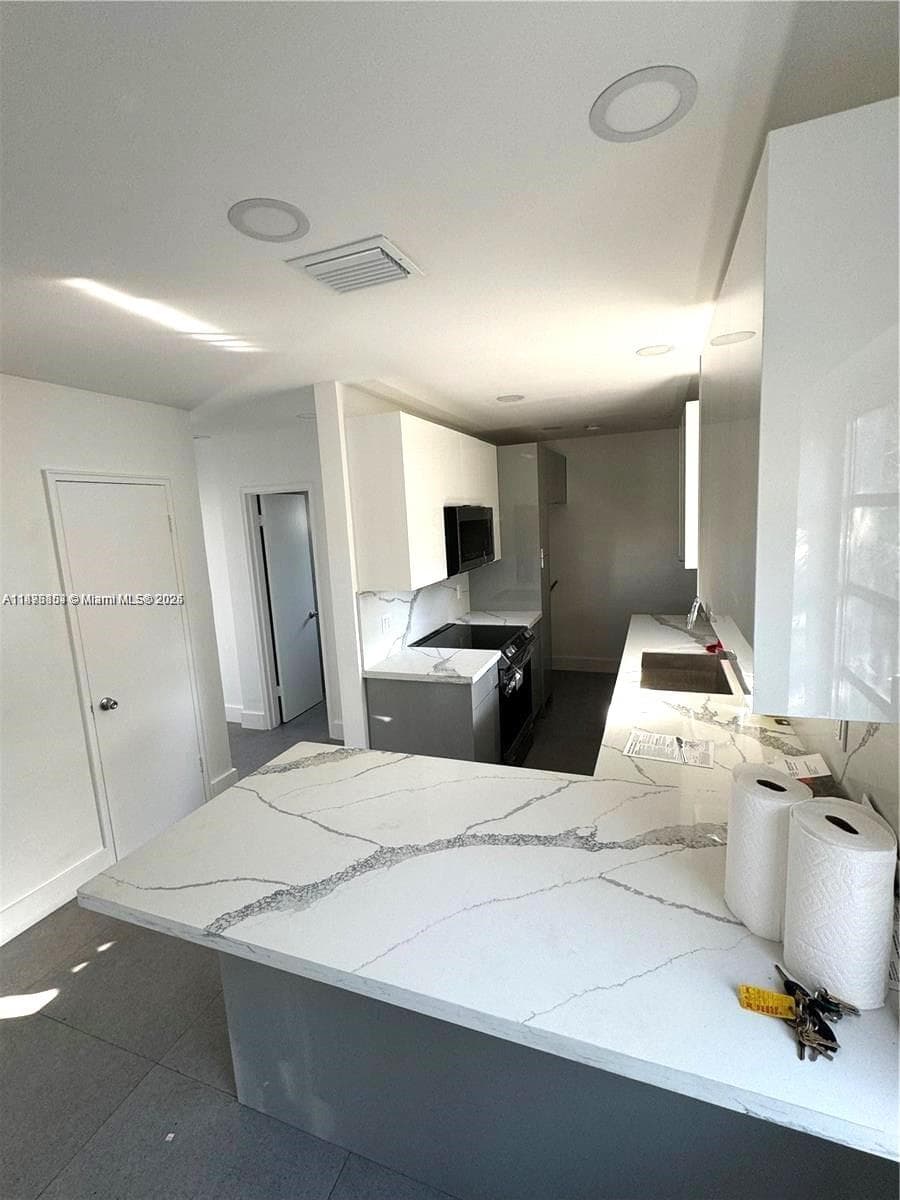 110 NW 120 Ter photo 4