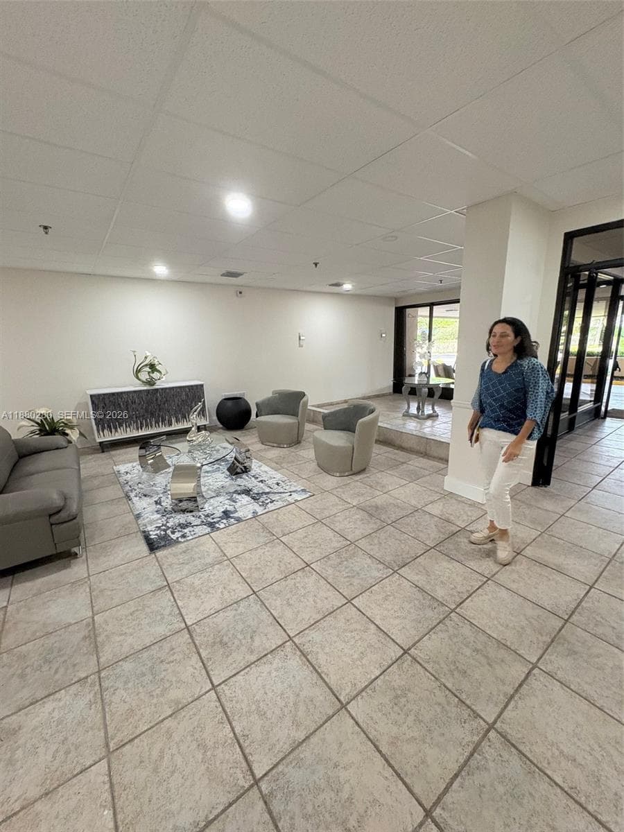 walk in lobby after checking in with doorman