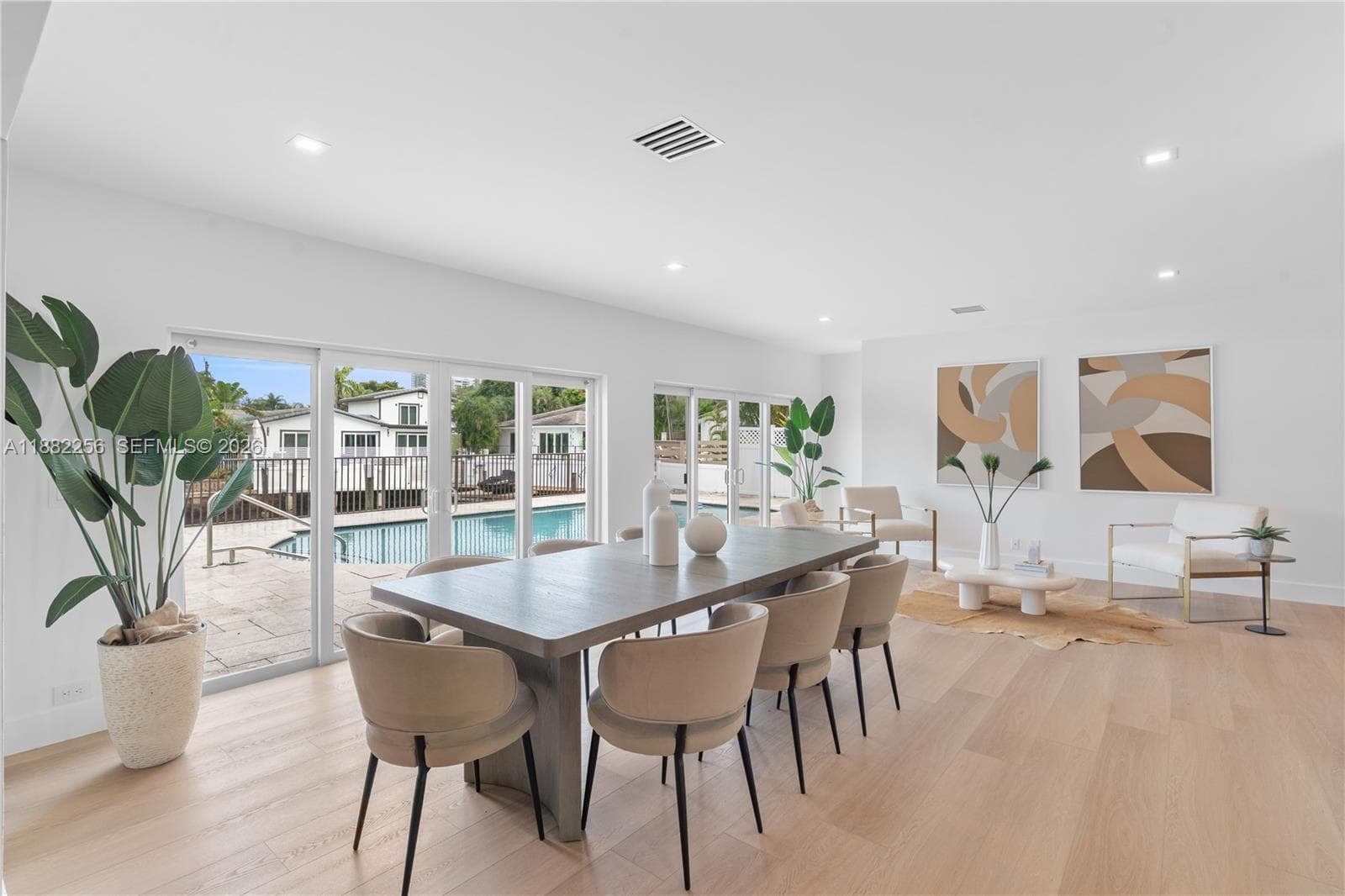 Primary suite opens to pool deck.