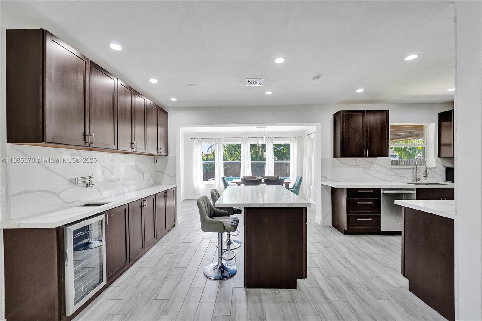 Amazing Remodeled Kitchen with Quartz Counters and Backsplash