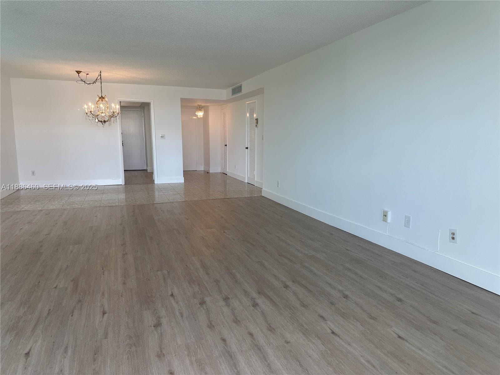 Dinning area toward the kitchen and the main entrance