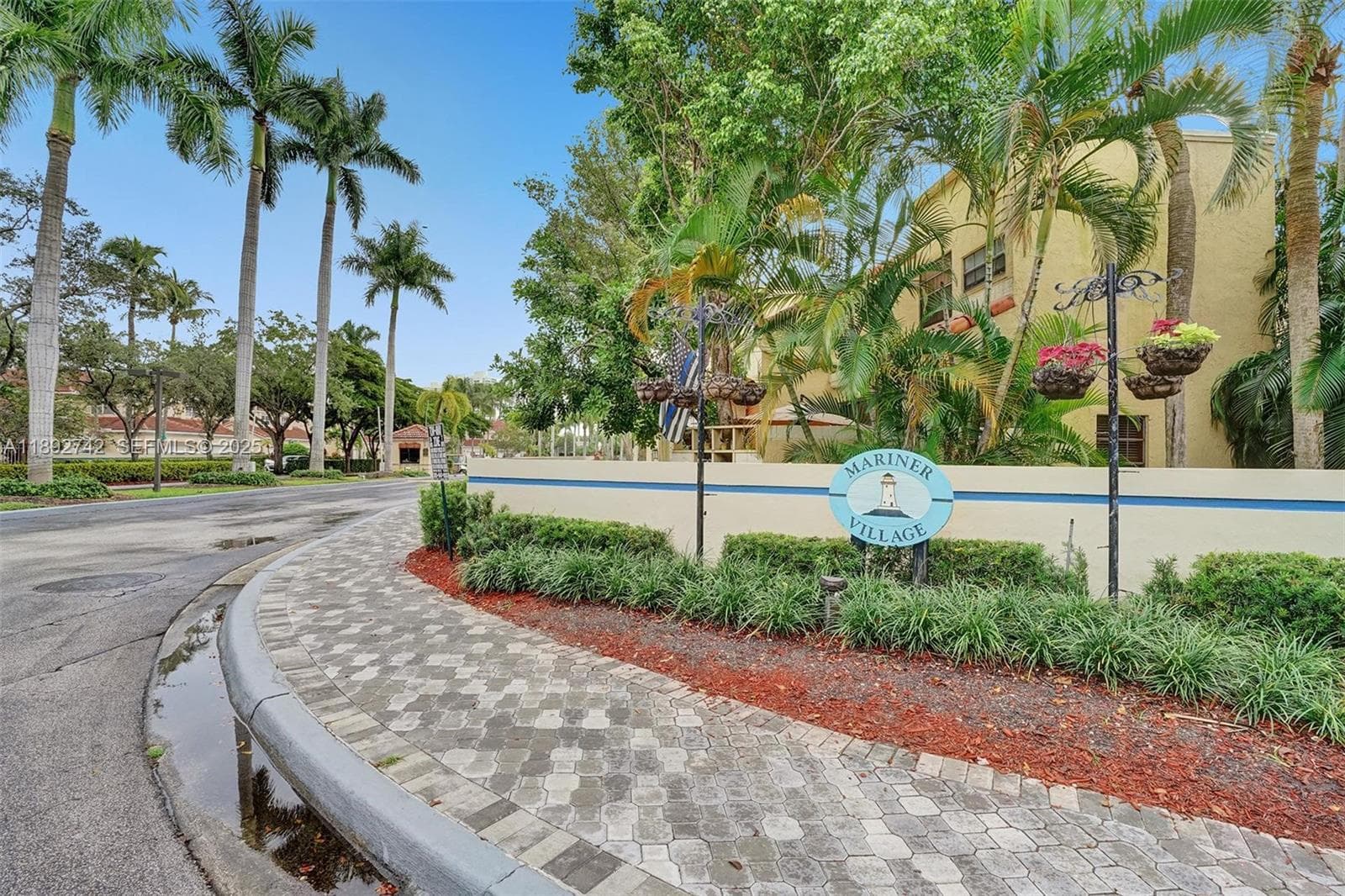 Mariner Village has guard gated entrance and tree-lined streets
