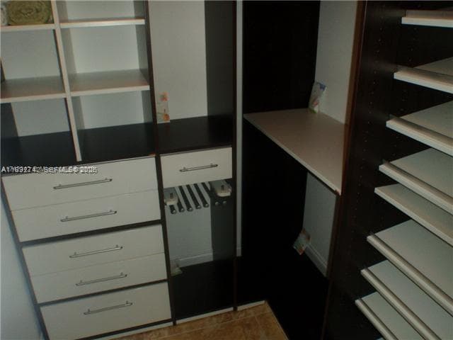 There are two closets. This one is walk in.