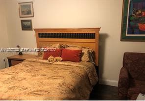 Bedroom is large enough for king and night stands or chair