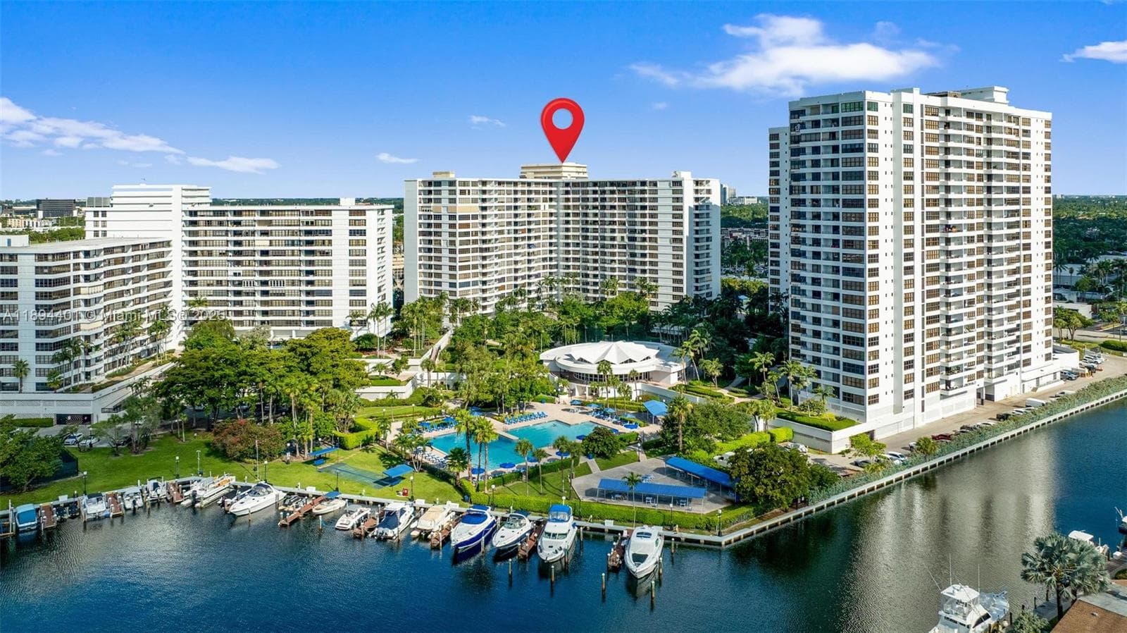 Rear view of Olympus Condo overlooking marina & intracoastal