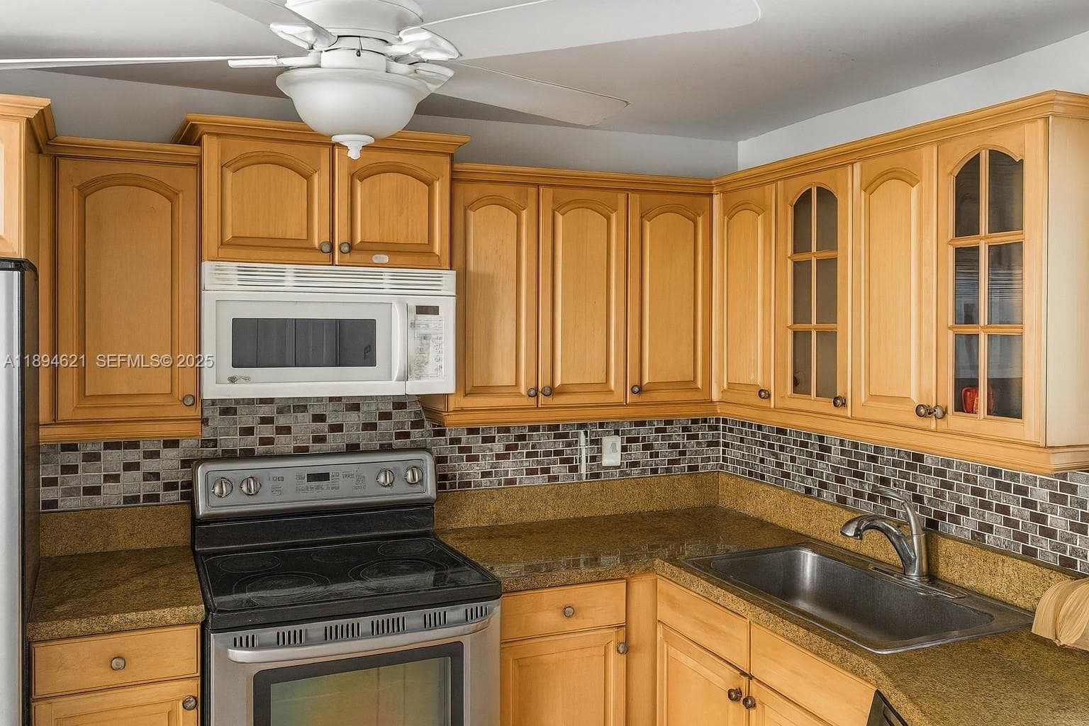 Kitchen with granite countertops.