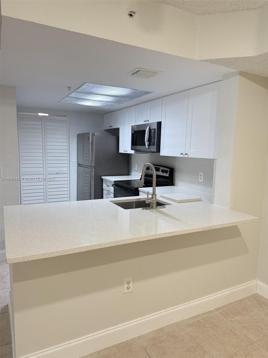 EVERGREEN LAKES CONDO · #205 in Coconut Creek - Photo 2