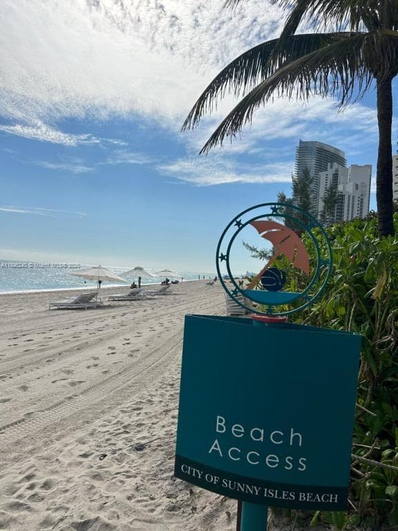 Beach access 1 block distance  form the building.