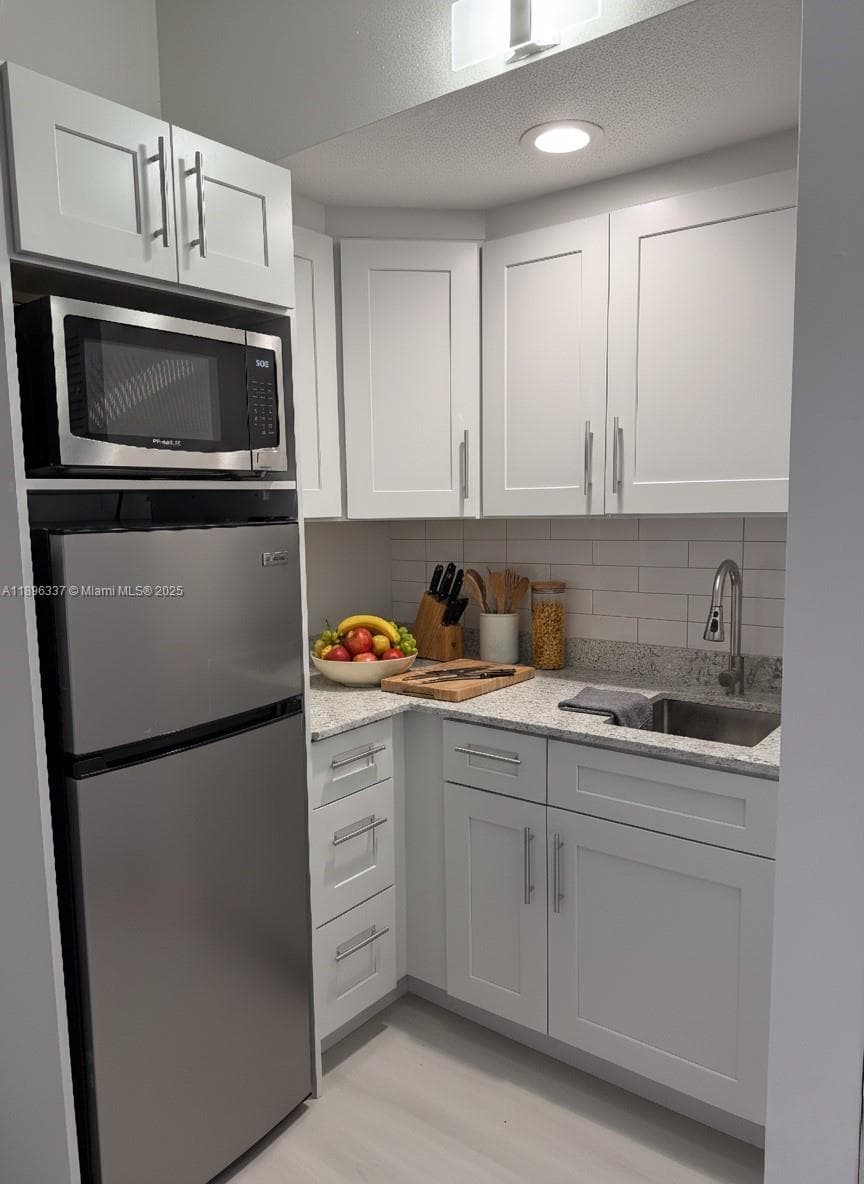 PALM BAY CONDOMINIUM · #1B in Miami - Photo 8