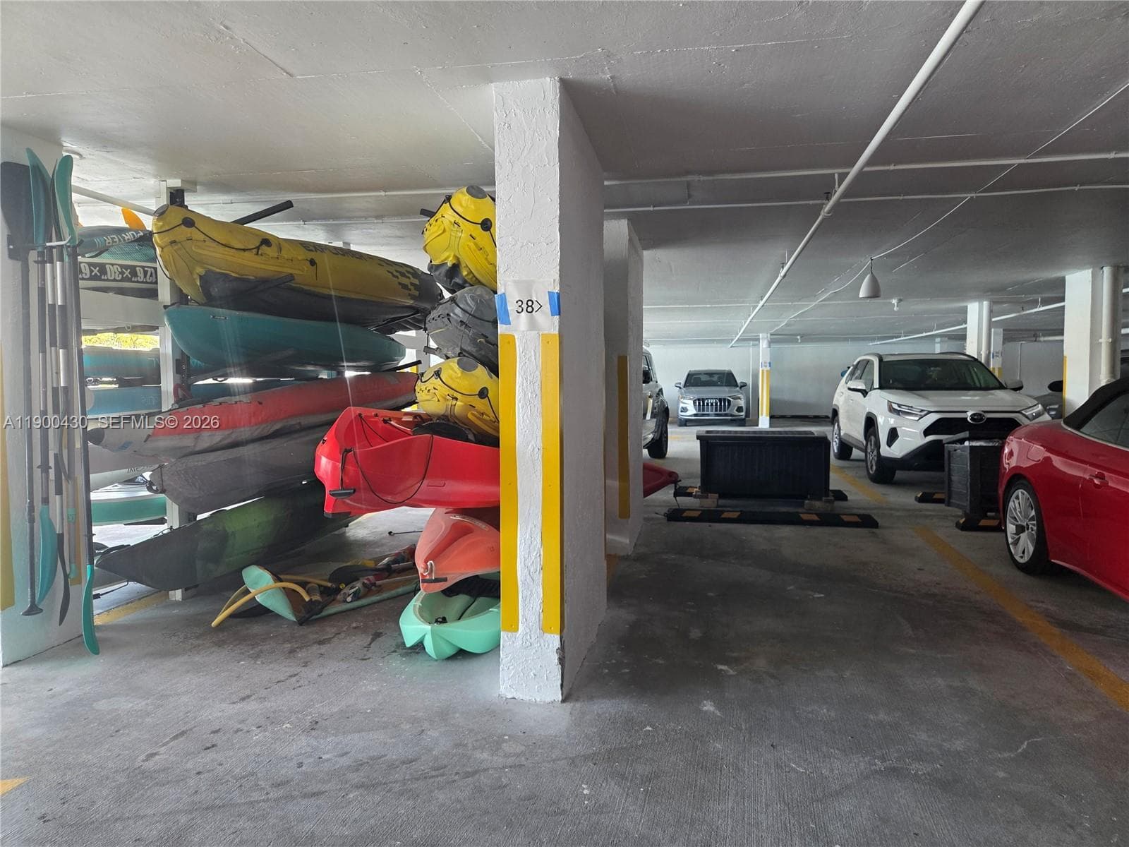 Covered parking space and surf board storage