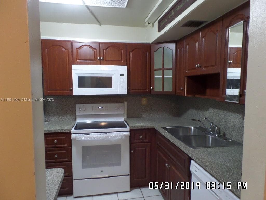 SUNSET HILLS I CONDOMINIU · #101 in Lauderdale Lakes - Photo 2