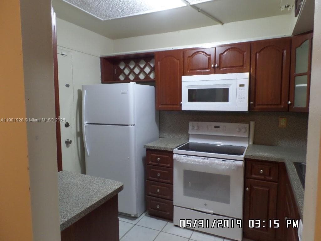 SUNSET HILLS I CONDOMINIU · #101 in Lauderdale Lakes - Photo 3