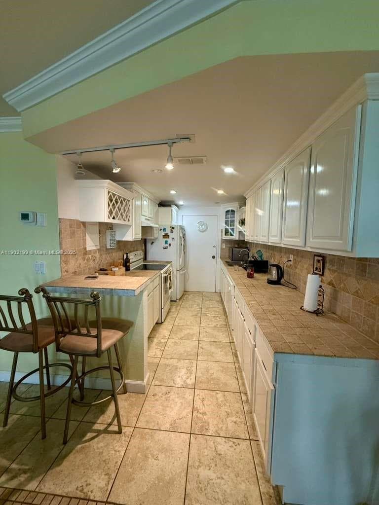 THE CARRIAGE HOUSE CONDO · #131 in Miami Beach - Photo 6
