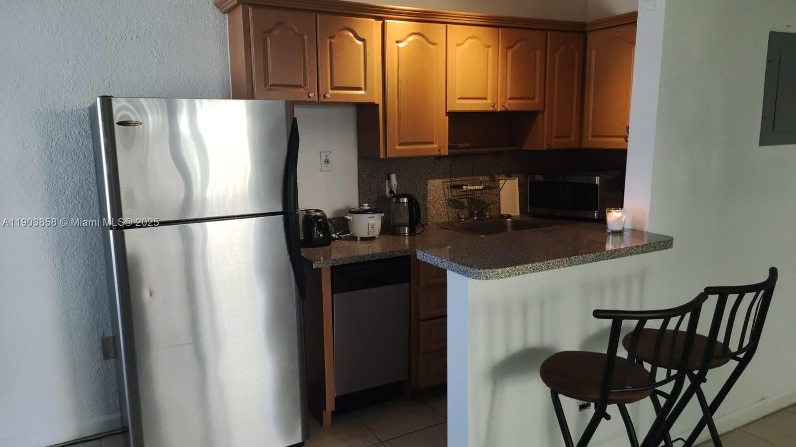 HIDDEN WATERS CONDO · #130 in North Miami - Photo 7
