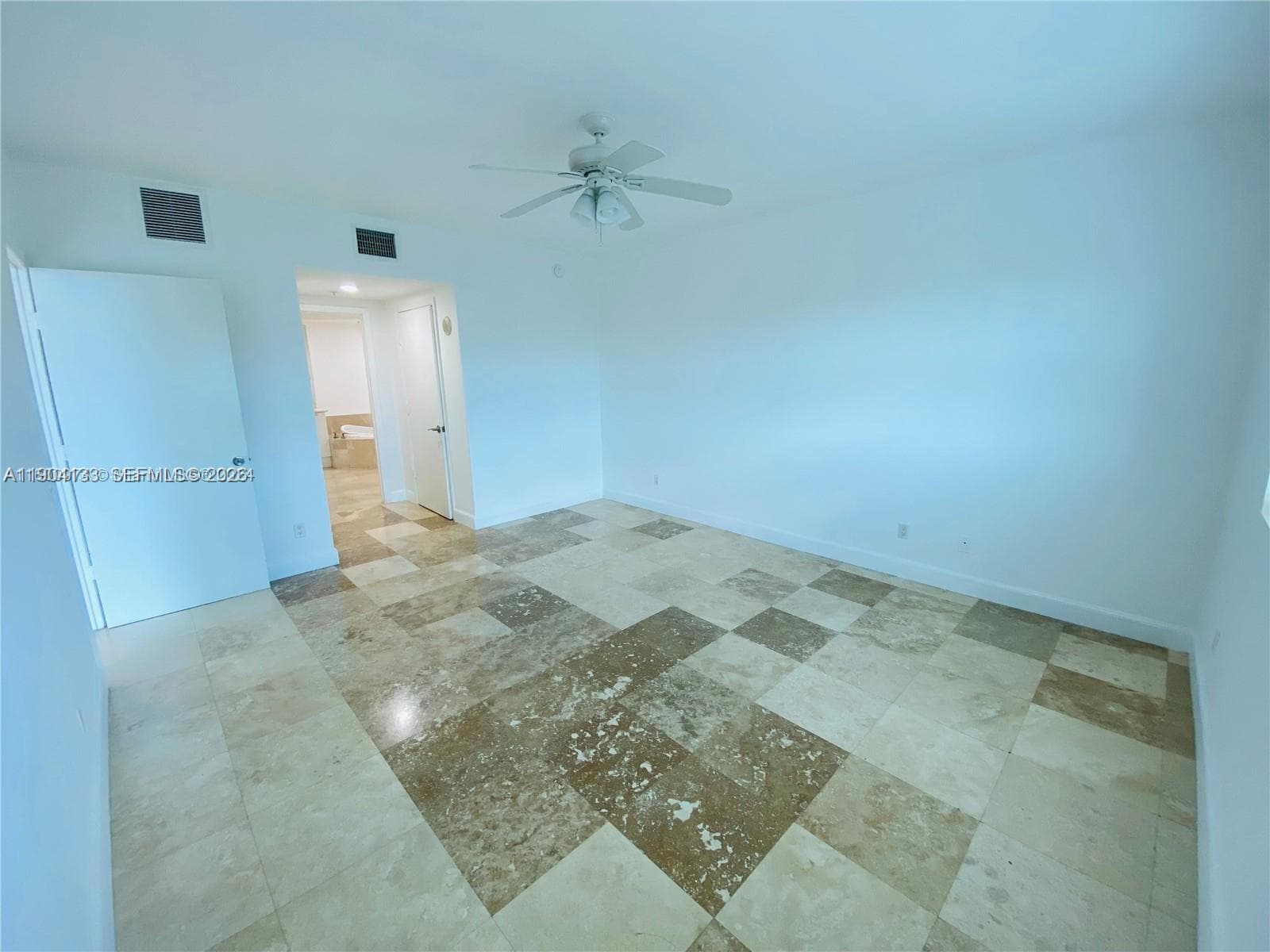 Master bathroom features dual sinks, jacuzzi tub and shower
