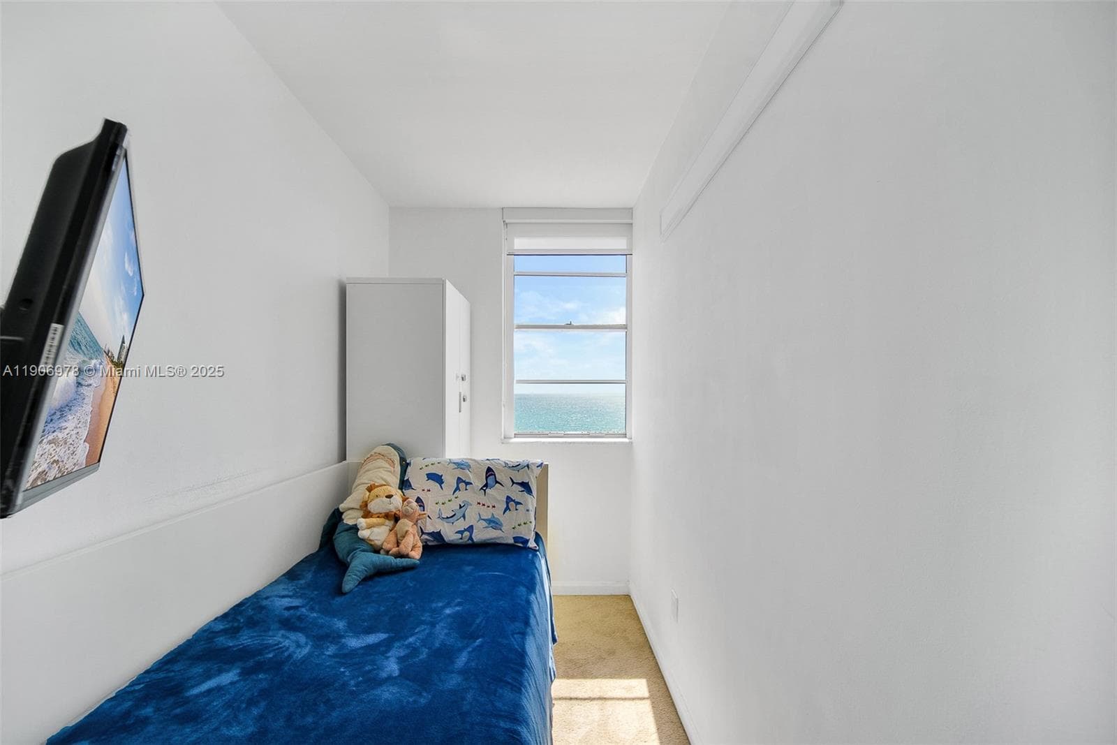 Den is divided in two with drywall, can easily be converted back into living area.