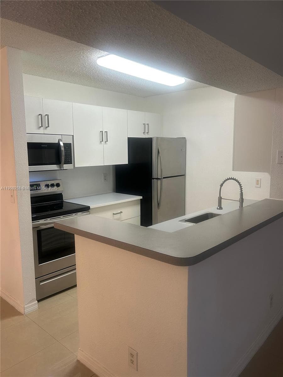 WINDWARD LAKES CONDO · #B310 in Pompano Beach - Photo 5